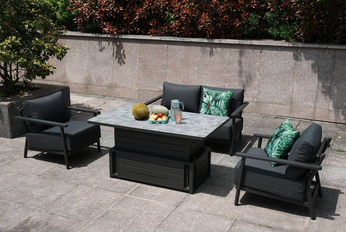 Aluminium 2 Seat Sofa Set with a rising table adorned with a green plant