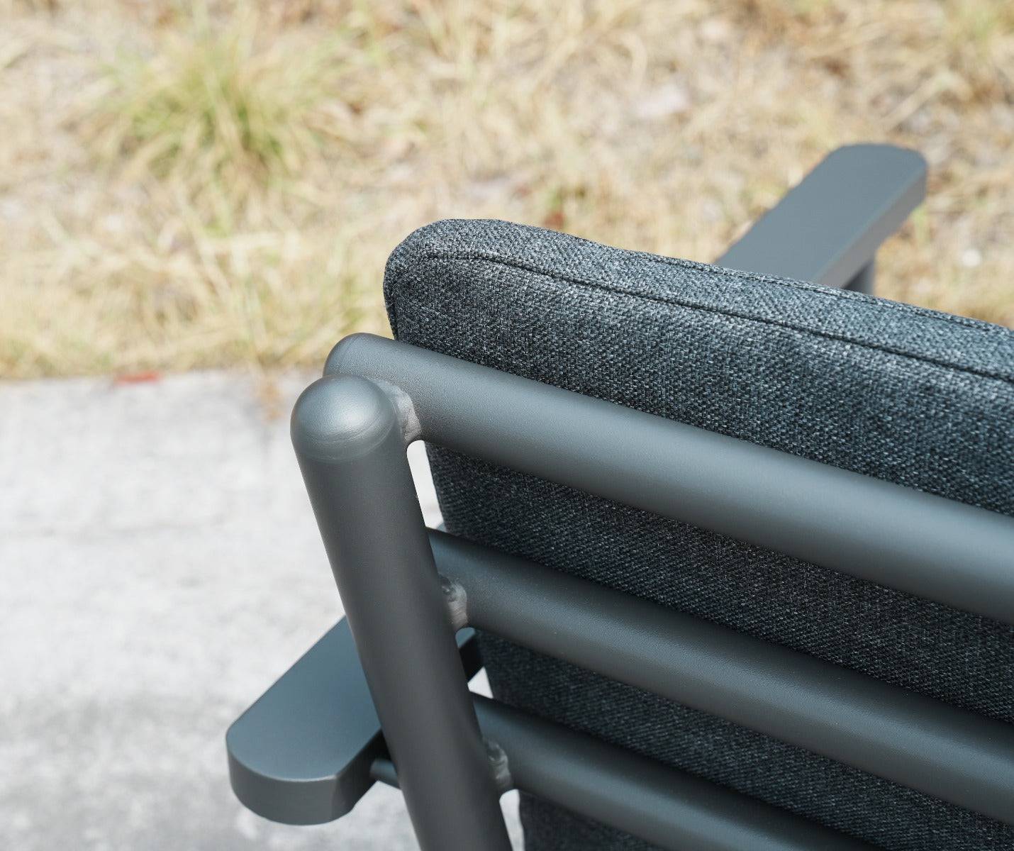 grey fabric cushion on an aluminum dining chair - Rattan Garden Furniture Essex